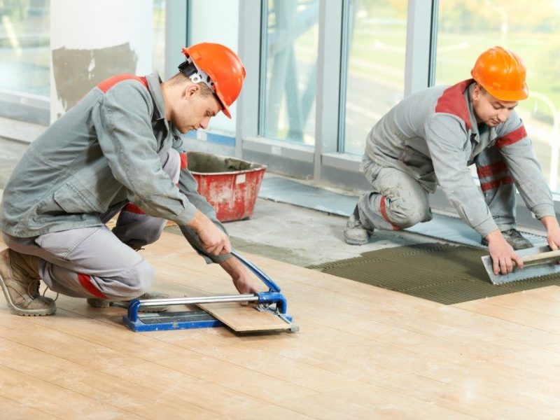 laying tile flooring